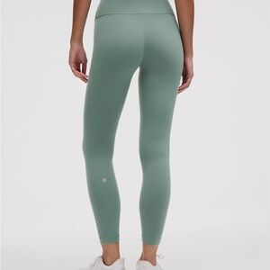 Wunder Train Contour Fit High-
Rise Tight 25"
